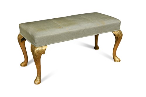 Lot 558 - A George II style gilt framed longstool