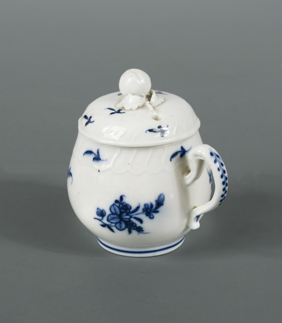 Lot 5 - A Tournai blue and white baluster custard cup...