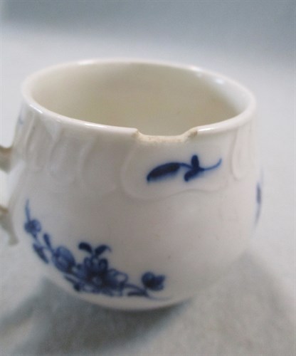 Lot 5 - A Tournai blue and white baluster custard cup...