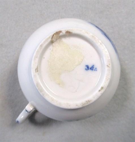 Lot 5 - A Tournai blue and white baluster custard cup...