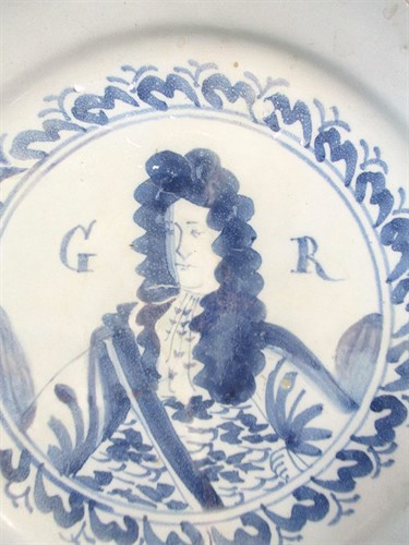 Lot 1 - A Delft blue and white Royal Portrait plate, probably Brislington or Bristol, circa 1714-20