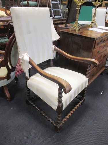Lot 351 - A pair of high back open arm oak elbow chairs...