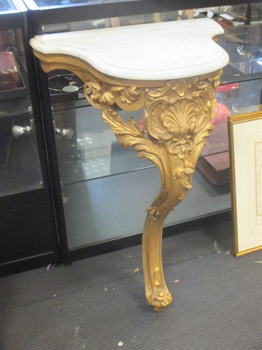 Lot 334 - A small giltwood monopodia console table with...