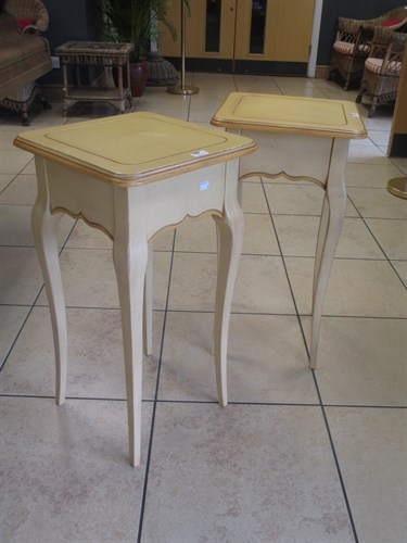 Lot 423 - A pair of yellow painted side tables