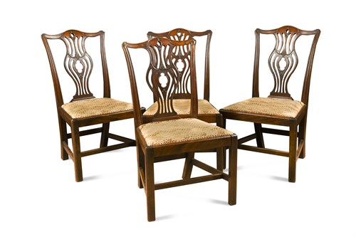 Lot 566 - A set of four early George III mahogany dining chairs