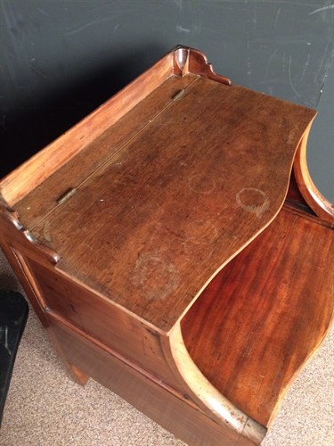 Lot 616 - A matched pair of George III mahogany night tables, (2)