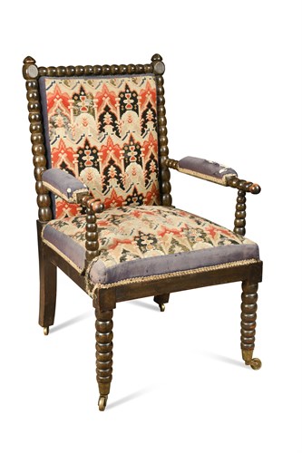 Lot 609 - A William IV ebonised beech bobbin turned frame armchair