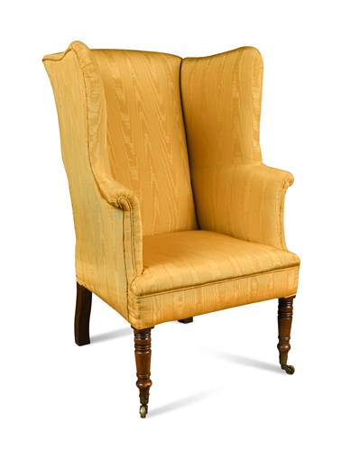 Lot 482 - A Regency mahogany framed wing armchair