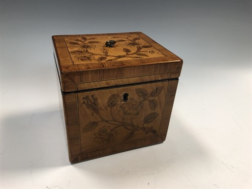Lot 385 - A George III pen work decorated tea caddy