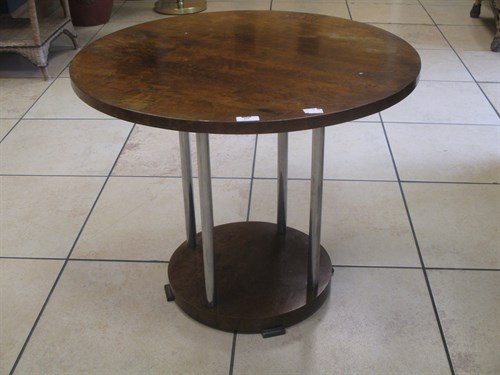 Lot 439 - An Art Deco walnut circular two tier...