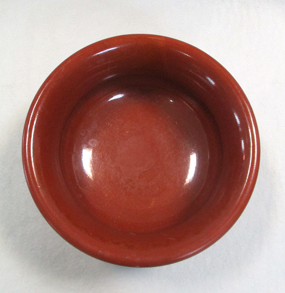 Lot 7 - A 19th century Wedgwood Rosso Antico two-handled pedestal bowl