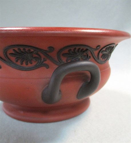 Lot 7 - A 19th century Wedgwood Rosso Antico two-handled pedestal bowl