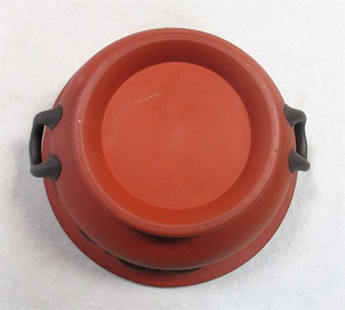 Lot 7 - A 19th century Wedgwood Rosso Antico two-handled pedestal bowl
