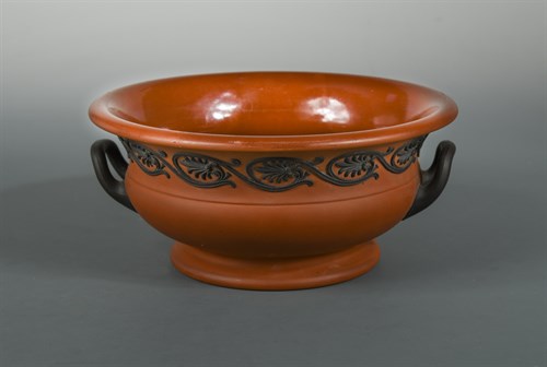 Lot 7 - A 19th century Wedgwood Rosso Antico two-handled pedestal bowl