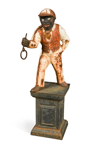 Lot 378 - An American cast iron and cold painted 'Lawn Jockey'