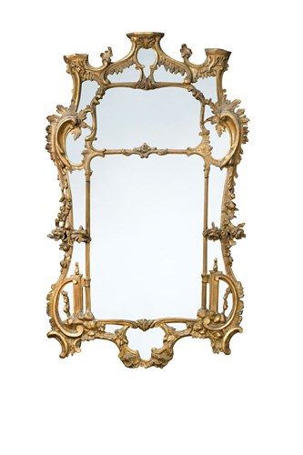 Lot 557 - A 19th century George II style gilt composition framed wall mirror