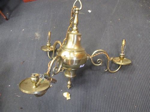 Lot 449 - A brass three branch chandelier