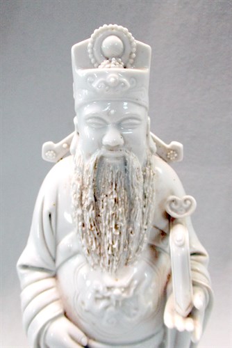 Lot 10 - A group of three Chinese Dehua figures of...