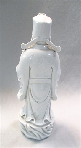 Lot 10 - A group of three Chinese Dehua figures of...