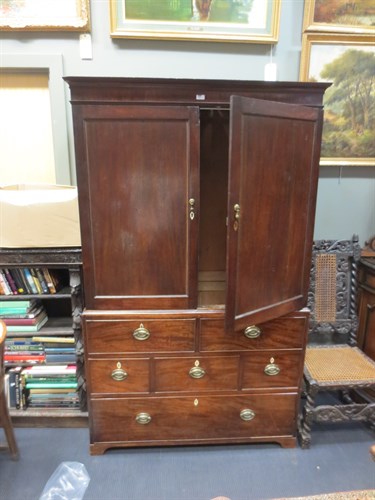 Lot 363 - A George IV mahogany linen press, the top...