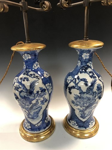 Lot 356 - A pair of 19th century Chinese blue and white vases fitted as table lamps