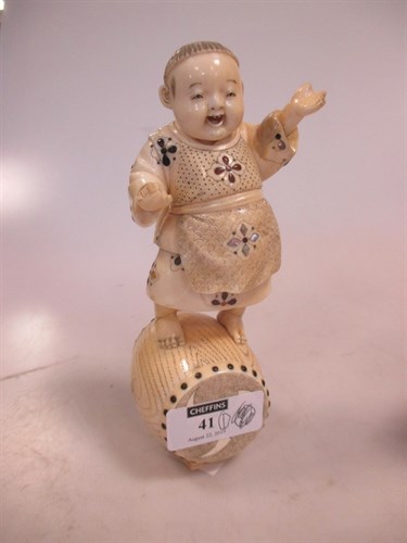 Lot 41 - A Japanese ivory okimono, modelled as a young...