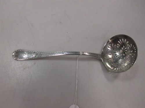 Lot 399 - A George III silver sifting spoon, the handle...