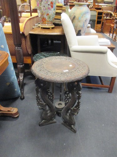 Lot 385 - An Indonesian hardwood occasional table