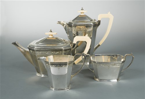 Lot 678 - A George VI silver four piece tea set