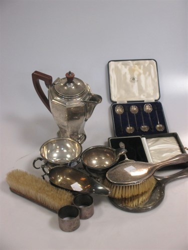 Lot 196 - A collection of silver wares, including a hot...