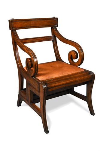 Lot 520 - A modern Regency style metamorphic mahogany library armchair