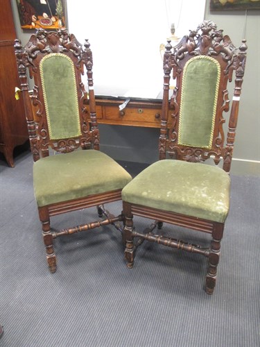 Lot 339 - A pair of Carolean style carved oak high back...