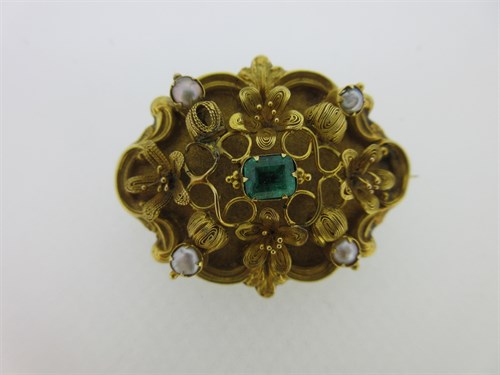 Lot 307 - An emerald, seed pearl and filigree brooch circa 1840 with hairwork compartment