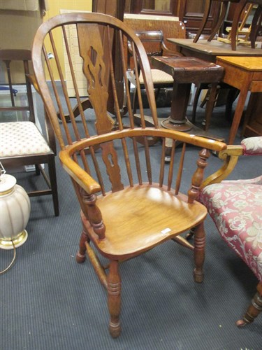 Lot 362 - A 19th century ash Windsor armchair