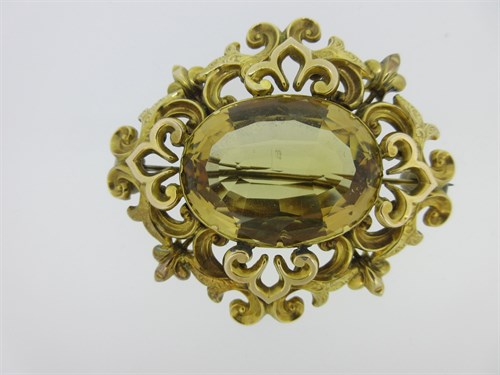 Lot 82 - A Victorian large lemon citrine brooch