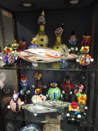 Lot 63 - A collection of Murano glass clowns and a fish