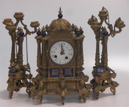Lot 142 - A 19th century gilt metal and enamel three...