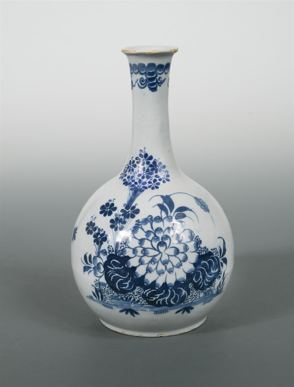 Lot 4 - A Delft blue and white water bottle, probably Liverpool, circa 1750