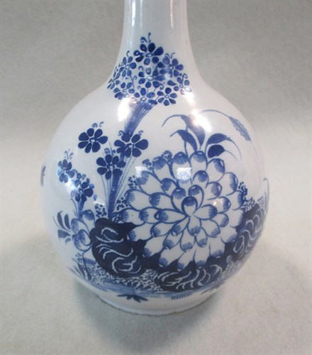 Lot 4 - A Delft blue and white water bottle, probably Liverpool, circa 1750