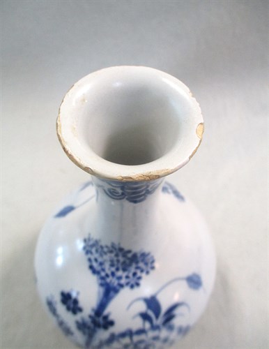 Lot 4 - A Delft blue and white water bottle, probably Liverpool, circa 1750