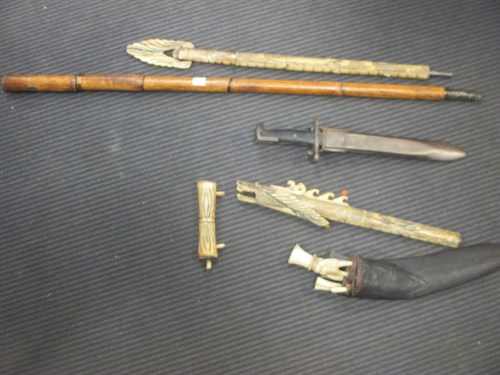 Lot 49 - A late 19th century Eastern swordstick, a...