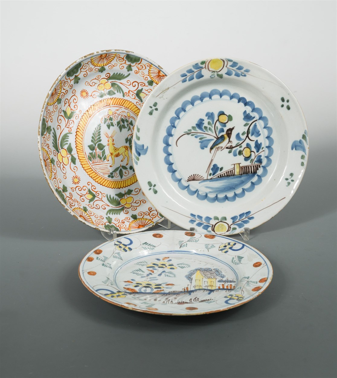 Lot 6 - A Delft polychrome plate, probably Liverpool