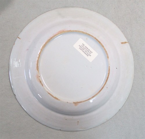 Lot 6 - A Delft polychrome plate, probably Liverpool