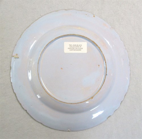 Lot 6 - A Delft polychrome plate, probably Liverpool