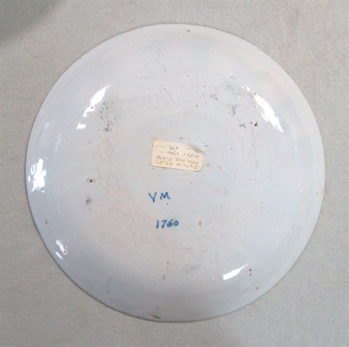 Lot 6 - A Delft polychrome plate, probably Liverpool