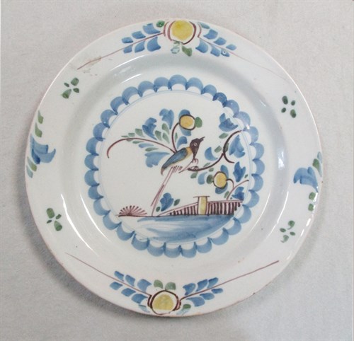 Lot 6 - A Delft polychrome plate, probably Liverpool