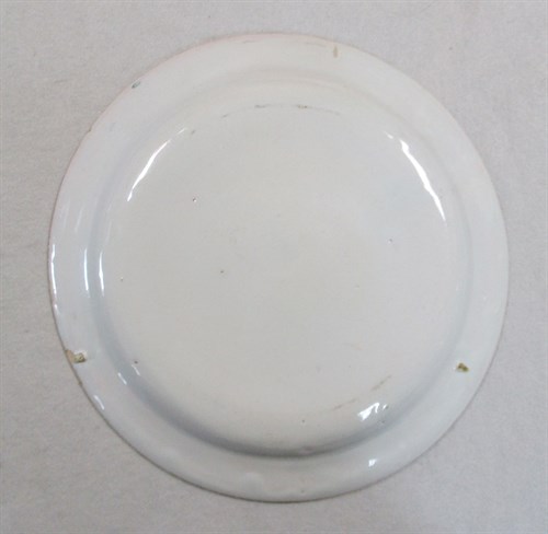 Lot 6 - A Delft polychrome plate, probably Liverpool