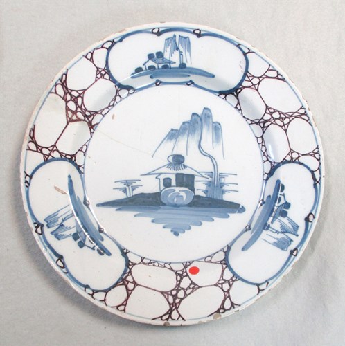 Lot 6 - A Delft polychrome plate, probably Liverpool