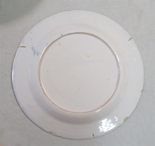 Lot 6 - A Delft polychrome plate, probably Liverpool