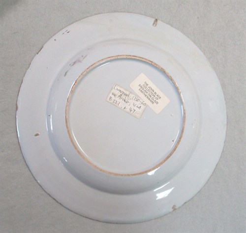 Lot 6 - A Delft polychrome plate, probably Liverpool
